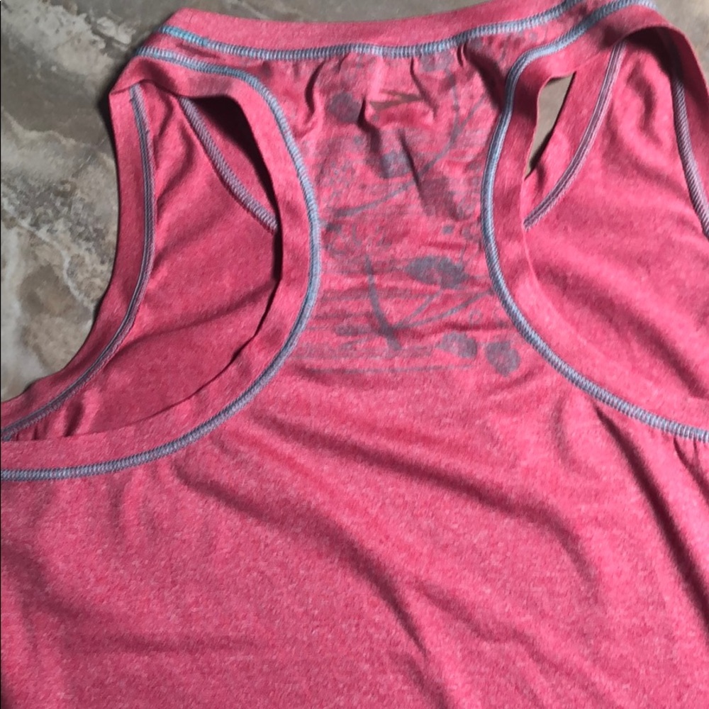 Brooks racer back tank in muted neon pink